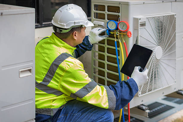 Professional Hvac technician working in Mc Dade, TX